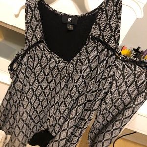 Black and white top with shoulder cutoffs
